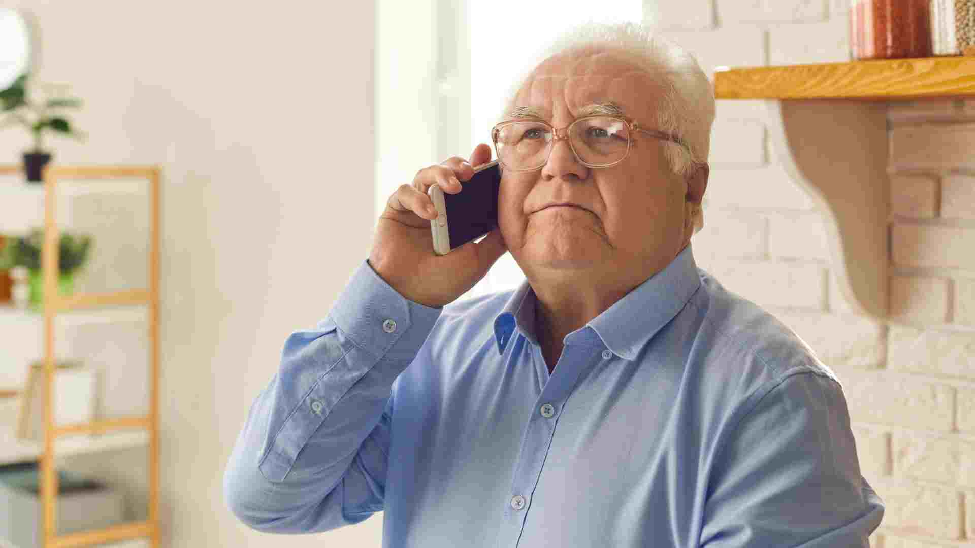 A man on the phone learning What to do after my spouse dies